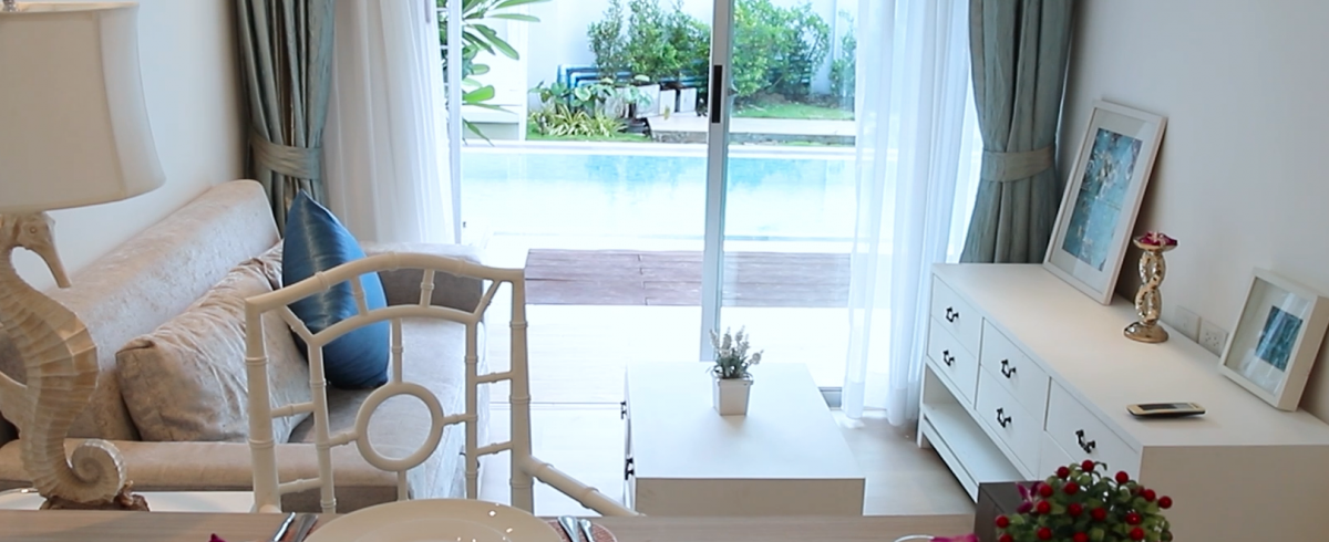 Living area opening onto the pool